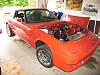 Post pics with After market wheels and/or with body kit-rx7-jackstands-fr-rt.jpg