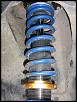 NOISY front coilover post brake service-passside.jpg