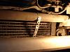Need Advice to Remove Oil Cooler - 84 GSL SE-plumber-strap_holding_oc.jpg