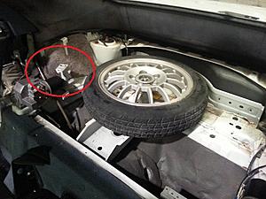 What is the brace on the convertible for in the spare well?-spare.jpg