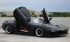 Stock bumpers with aftermarket fenders??-rx7-garage14.jpg