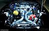 Aluminum thermostat neck-rx7-engine-bay.jpg
