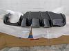 Has anyone removed the rear bumper skirt?-diffuser-1.jpeg