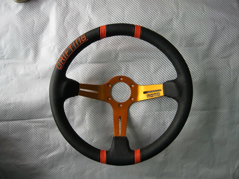 Name:  MOMO_Universal_Car_Aluminium_Racing_Steering_Wheel_zpse3e76a96.jpg
Views: 1033
Size:  115.1 KB