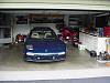 Hi with 2 owner '94 FD Touring 5spd Blue/Tan...-rx7frontfar.jpg