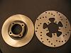 Change the bolt pattern on RX3 front brakes?-racing-store-brake-kit-vs-stock-rotor.jpg