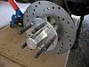 Change the bolt pattern on RX3 front brakes?-new-rotor-hub.jpg