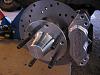 Change the bolt pattern on RX3 front brakes?-assembled-brakes.jpg