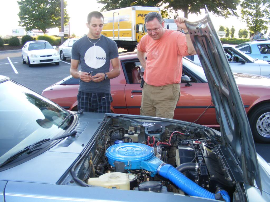 Name:  MikeShowingModstoDonnie.jpg
Views: 86
Size:  132.3 KB