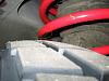 Pic:Front Tire rubs spring coil buttom when making U-turn or going thru curvy surface-rub2.jpg